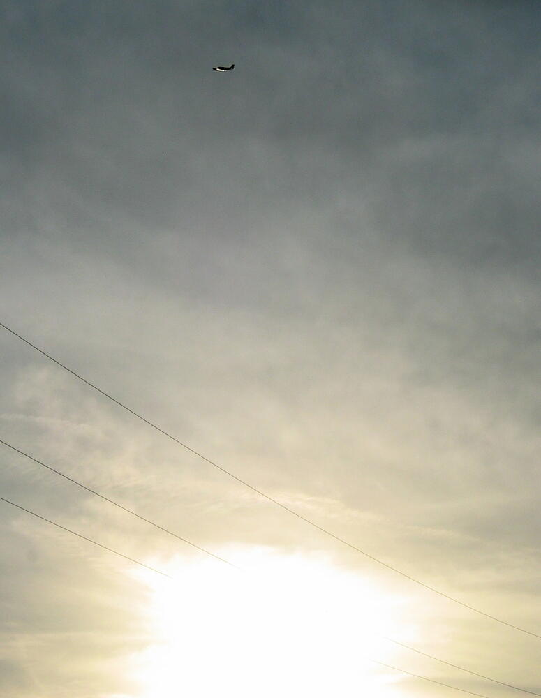 An aeroplane up in the sky.