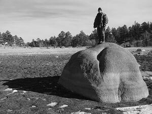 Jonah on rock in Lake Molly