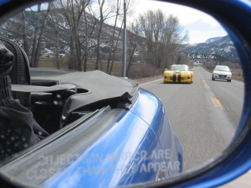 Objects in Mirror Are Closer Than They Appear