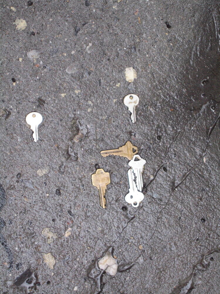 Keys at the base of art bollard