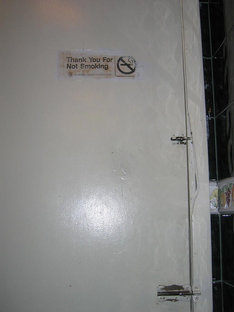 Typical bathroom door with multiple locks, only one of which actually works