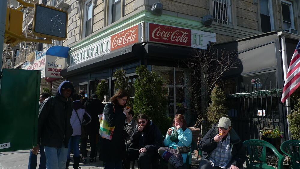 Waiting in line at Tom's with orange slices