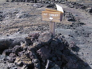 <-- PIT TOILET