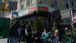Waiting in line at Tom's with orange slices